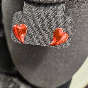 Red metal heart shaped earrings